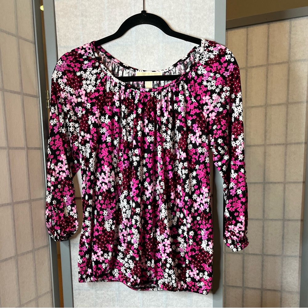 Michael Kors black top with floral in shades of pink & white